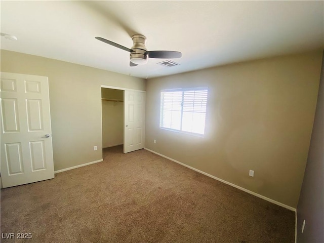 unfurnished bedroom featuring visible vents, a ceiling fan, a closet, carpet, and baseboards