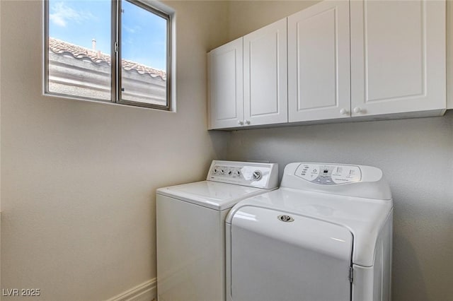 laundry area featuring cabinet space and washer and dryer