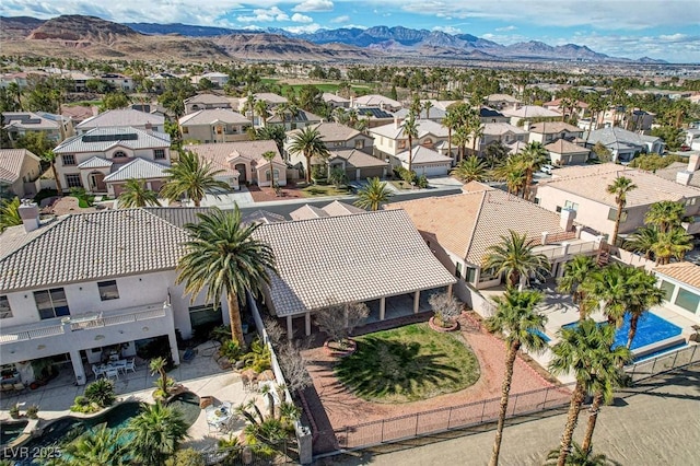 bird's eye view featuring a residential view and a mountain view