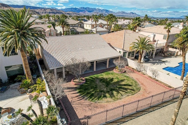 birds eye view of property featuring a mountain view and a residential view