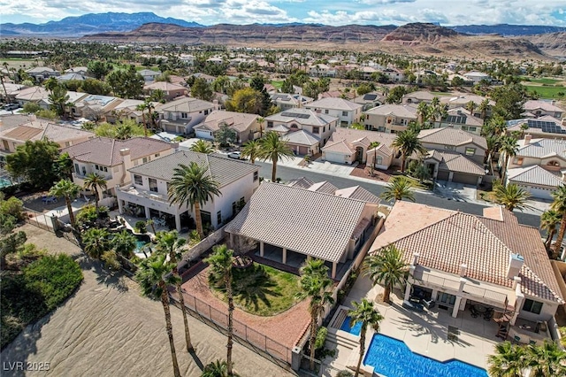 aerial view with a mountain view and a residential view