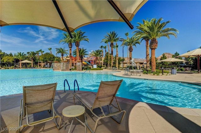 community pool featuring a patio