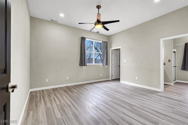 unfurnished bedroom with ceiling fan, visible vents, light wood-type flooring, and baseboards