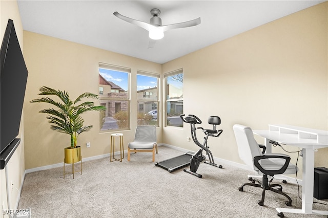 workout area with carpet flooring, baseboards, and ceiling fan