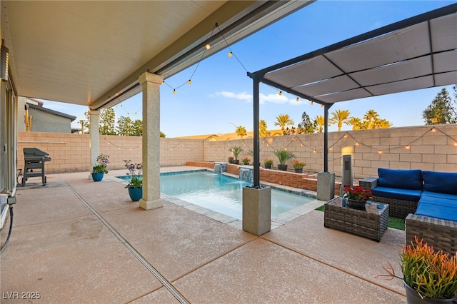 view of swimming pool featuring outdoor lounge area, a patio area, a fenced in pool, and a fenced backyard