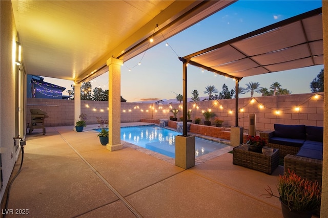 view of swimming pool featuring a patio area, a fenced in pool, an outdoor hangout area, and a fenced backyard