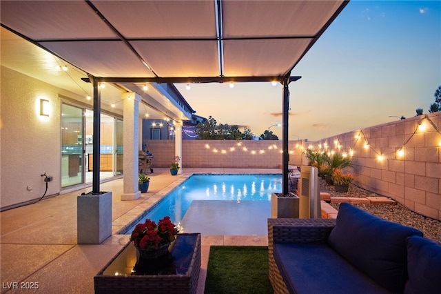 view of swimming pool featuring a patio area, a fenced in pool, outdoor lounge area, and a fenced backyard