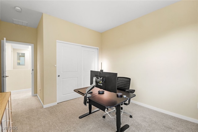 home office featuring carpet, visible vents, and baseboards