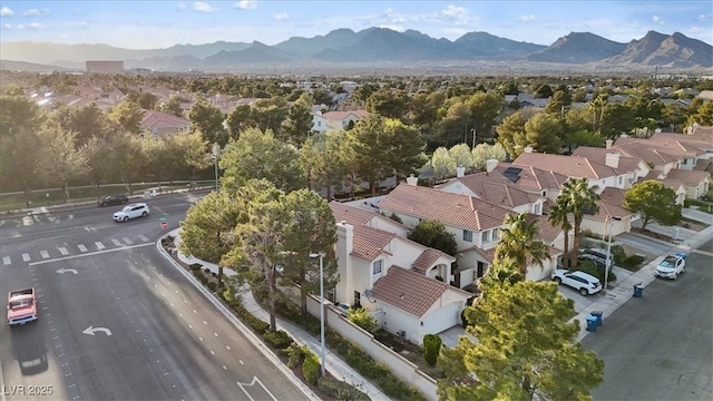 drone / aerial view with a mountain view and a residential view