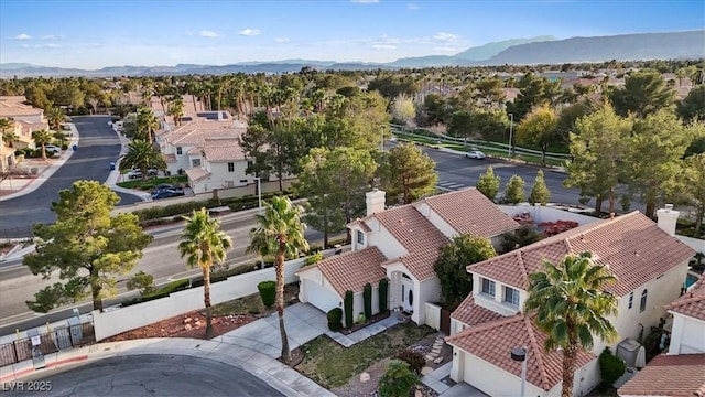 drone / aerial view featuring a mountain view and a residential view