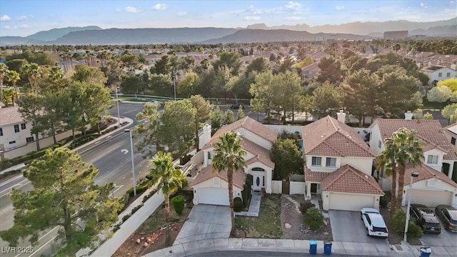 bird's eye view featuring a mountain view and a residential view