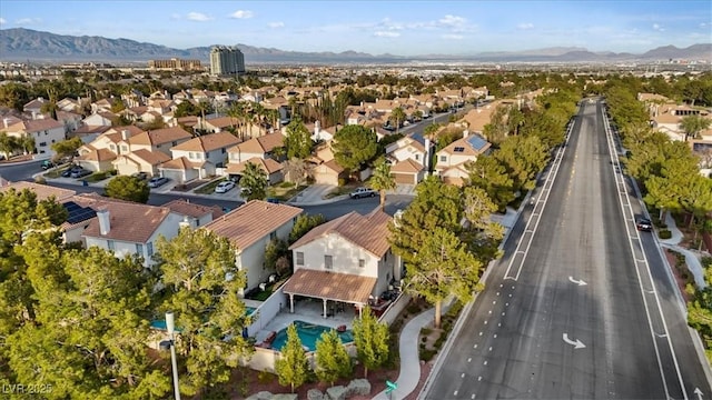 bird's eye view with a residential view and a mountain view