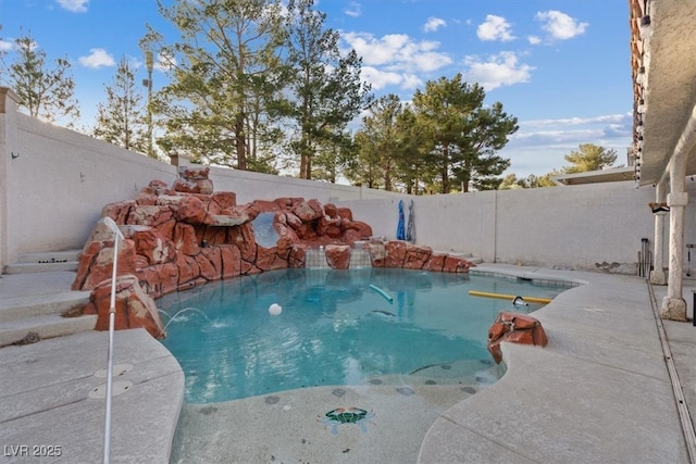 view of pool with a fenced backyard and a fenced in pool