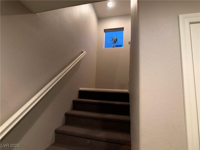 stairs with recessed lighting