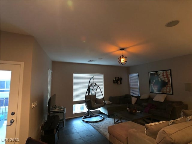 living room featuring visible vents