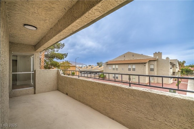 balcony featuring a residential view