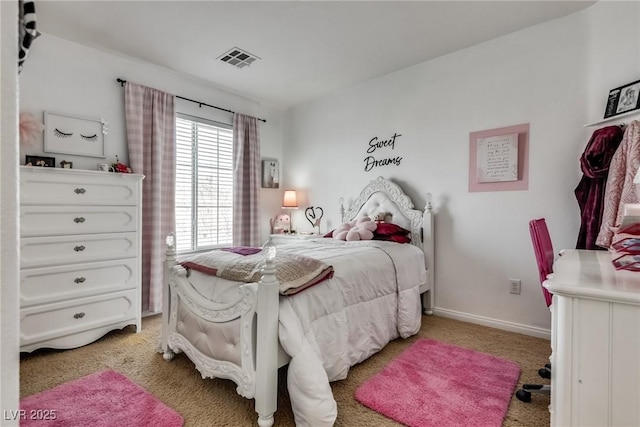 bedroom featuring visible vents, baseboards, and light carpet