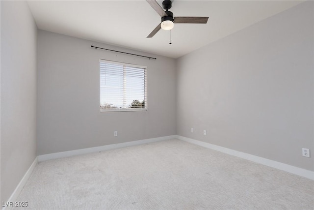 unfurnished room with baseboards, carpet floors, and ceiling fan