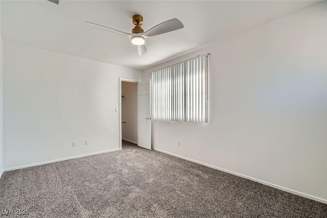 carpeted empty room with baseboards and ceiling fan