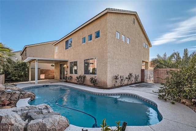 view of swimming pool with a fenced in pool, a patio area, and fence