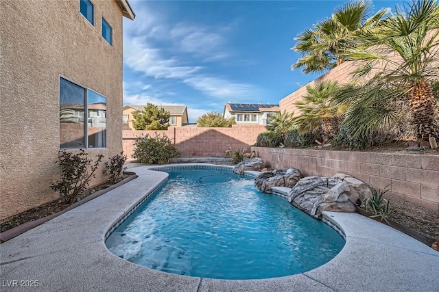 view of pool with a fenced backyard and a fenced in pool