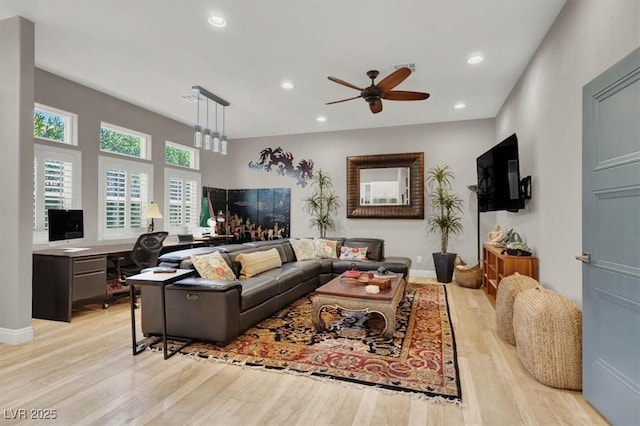 living room with recessed lighting, baseboards, light wood finished floors, and ceiling fan