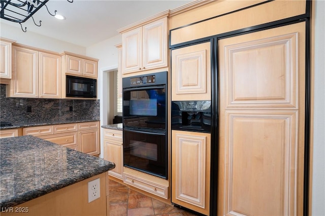 kitchen featuring black appliances, light brown cabinetry, dark stone countertops, backsplash, and recessed lighting