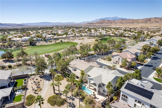 birds eye view of property featuring a residential view, a mountain view, and view of golf course