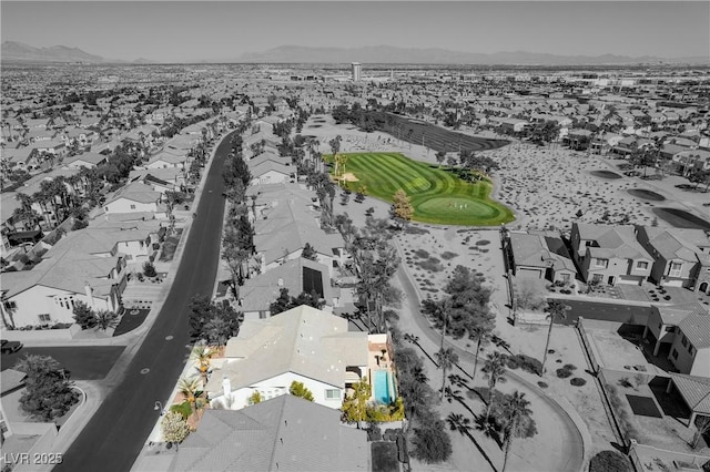 birds eye view of property featuring a residential view and view of golf course