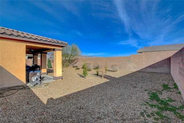 view of yard featuring a fenced backyard and a patio area