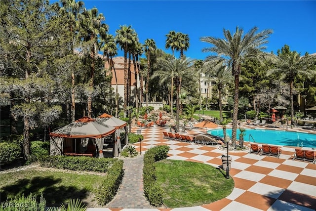 pool featuring a gazebo and a patio