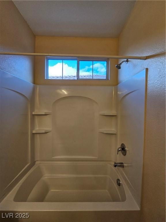 bathroom featuring tub / shower combination