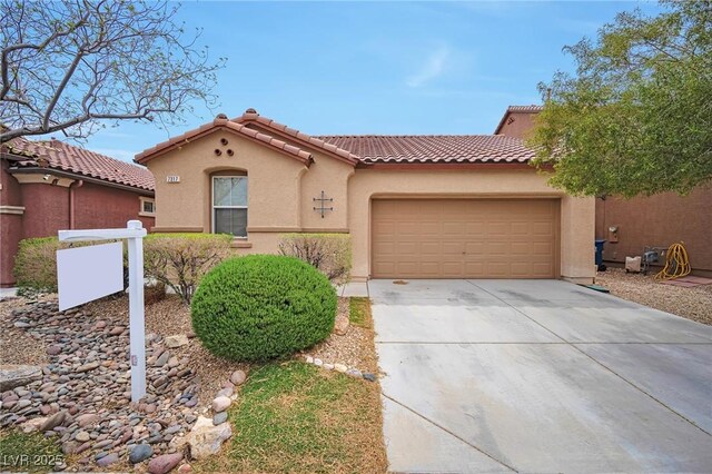 7317 Caballo Range Ave, Las Vegas, NV 89179 - mediterranean / spanish house featuring a tiled roof, stucco siding, driveway, and a garage