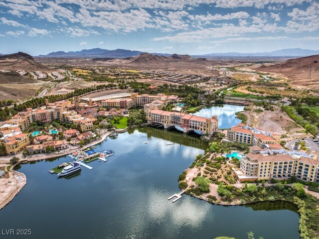 bird's eye view featuring a water and mountain view