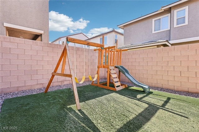 view of playground featuring a fenced backyard