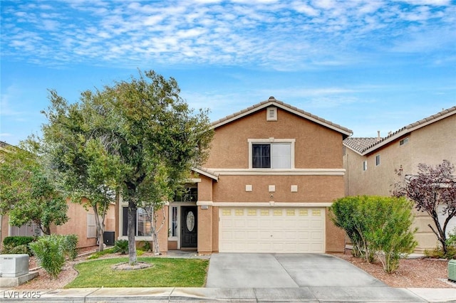 traditional home with stucco siding, a front yard, a garage, and driveway