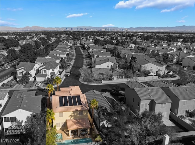 aerial view with a mountain view and a residential view