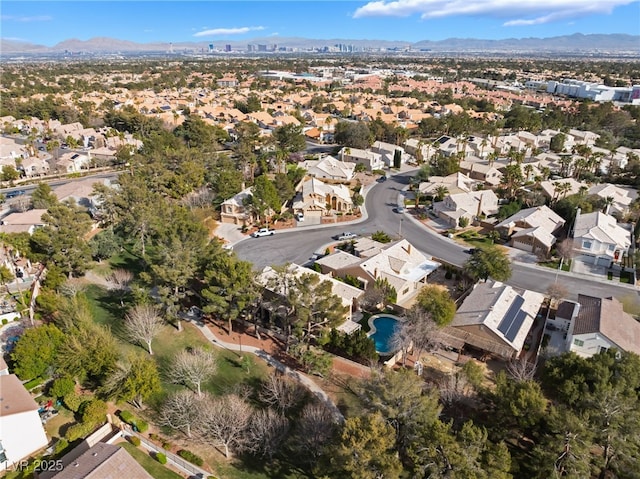 birds eye view of property featuring a mountain view and a residential view