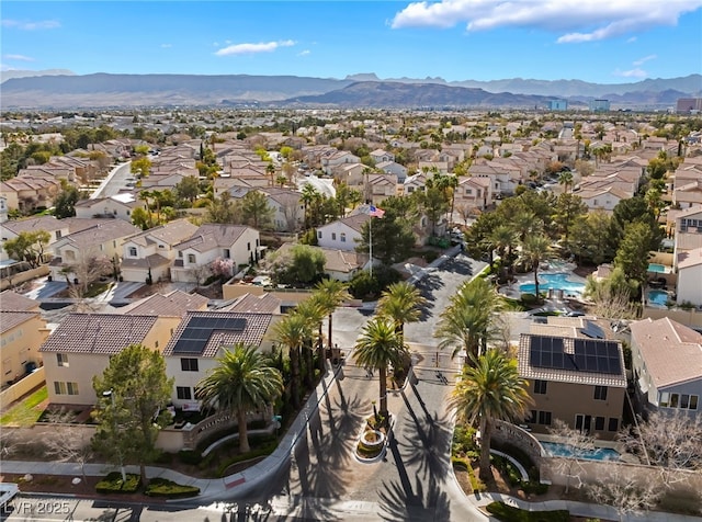 aerial view featuring a mountain view and a residential view