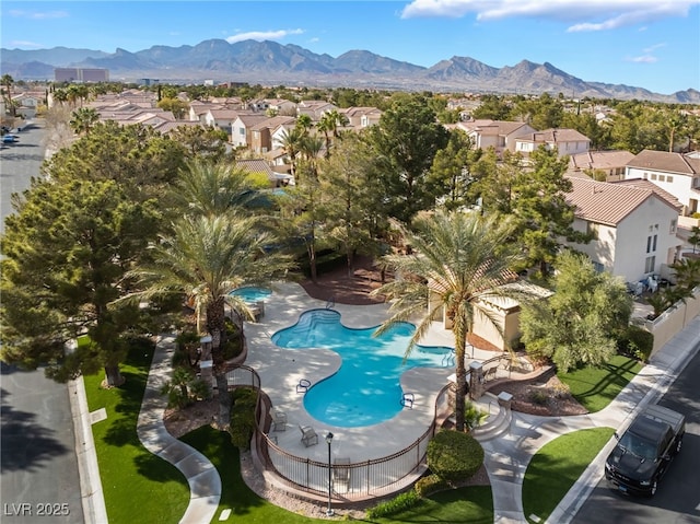 drone / aerial view with a mountain view and a residential view