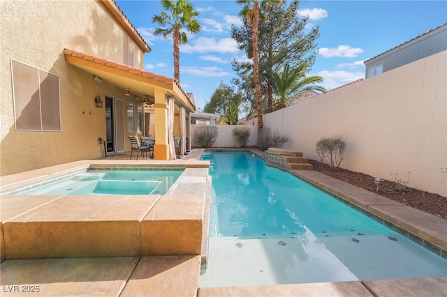 view of swimming pool with a patio, a fenced in pool, a fenced backyard, and an in ground hot tub