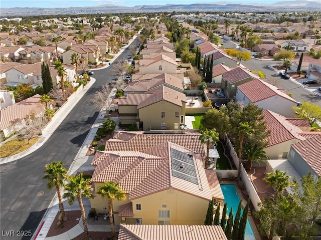 aerial view with a mountain view and a residential view