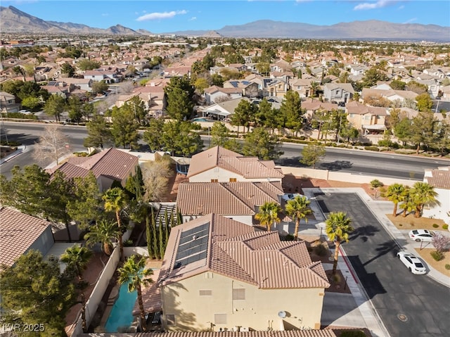 drone / aerial view with a mountain view and a residential view