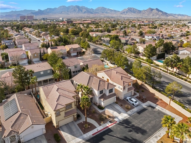 aerial view with a mountain view and a residential view