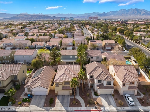 bird's eye view featuring a mountain view and a residential view