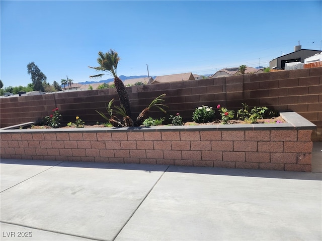 view of patio / terrace featuring fence