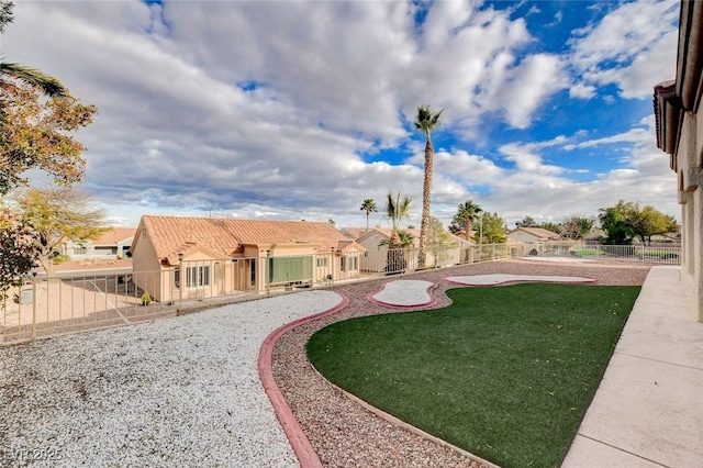 view of yard with a fenced backyard