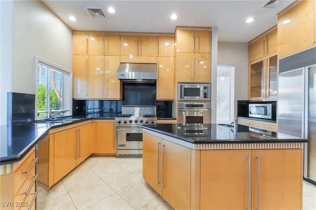 2221 Glenbrook Way, Las Vegas, NV 89117 - kitchen with visible vents, a sink, backsplash, built in appliances, and extractor fan