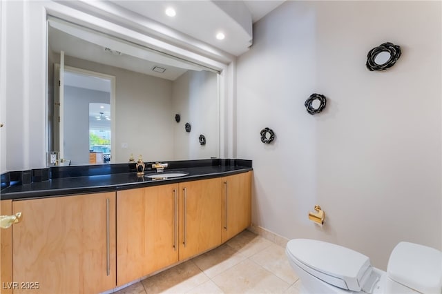 2221 Glenbrook Way, Las Vegas, NV 89117 - bathroom with tile patterned flooring, toilet, vanity, and baseboards