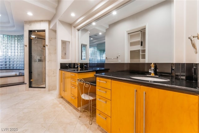 2221 Glenbrook Way, Las Vegas, NV 89117 - bathroom with tile patterned flooring, a shower stall, two vanities, and a sink